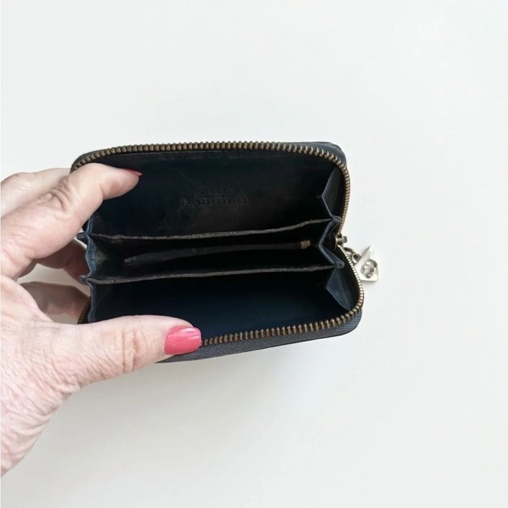 Gucci Black GG Embossed Zip-Around Coin Wallet with Star Charm